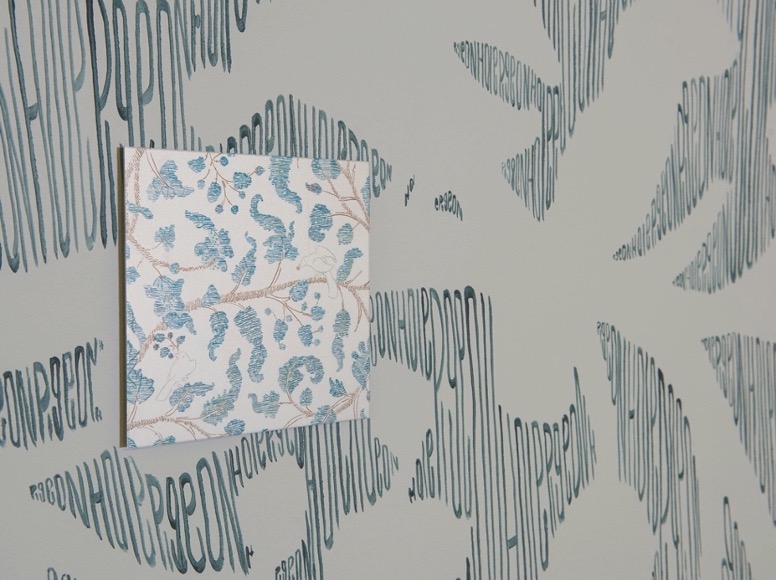 Figure 2. “Nest: Blue Tit”, 2014, 18 cm x 18 cm pencil drawings on Mylar mounted on aluminium, within larger 5 m x 10 m wall drawing titled “Nest: Pigeonhole”, at The Collection Museum, Lincoln. Photo credit: Andrew Weekes.