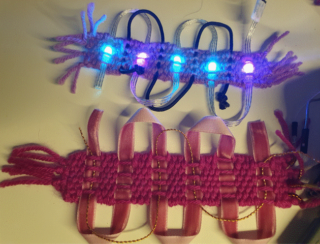 Figure 6: Proof of concept. The woven binary passementerie circuits controlling the colours of LEDs in a woven LED circuit