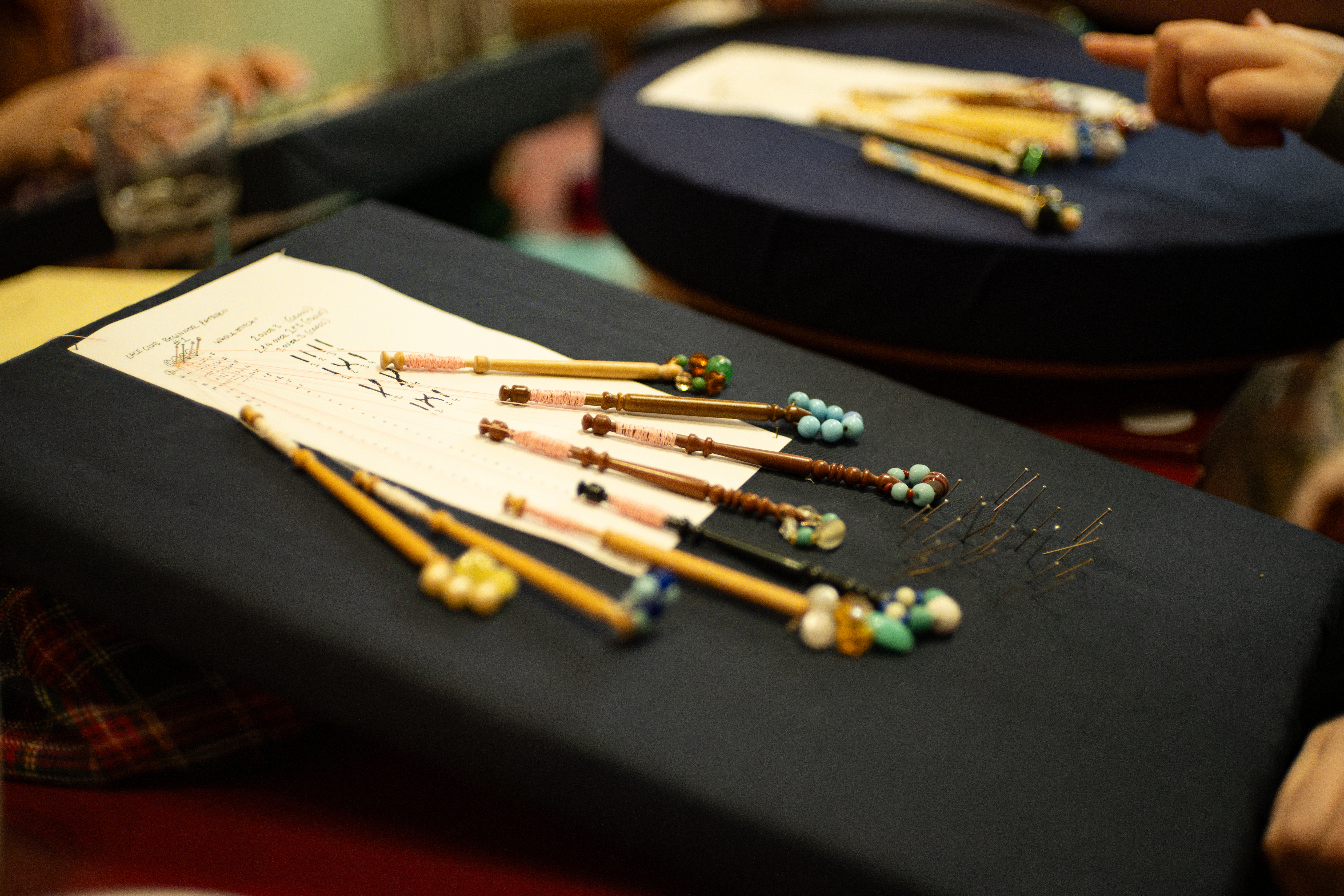Figure 3: Bobbin lace pattern from workshop with London Lace Club, The Glitch, November 2024. Photographer: Ava Majumdar.